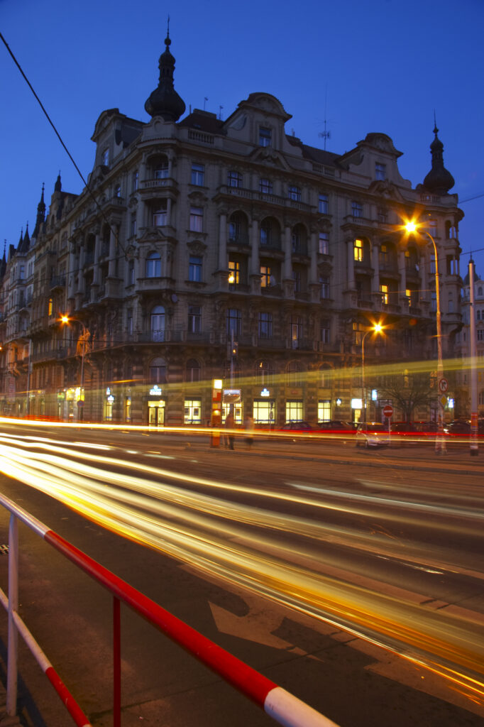 Czech Republic, Prague, Prague City. Cityscape scene of traffic trails at dusk through a busy street in the city of Prague.