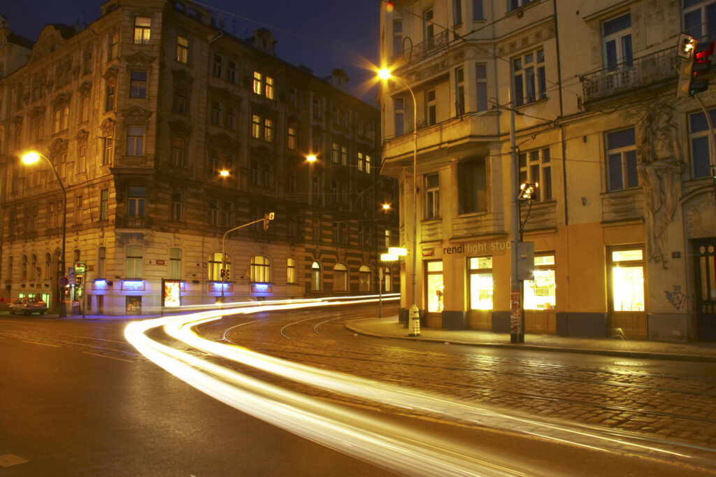 Czech Republic, Prague, Prague City. Cityscape scene of traffic trails at dusk through a busy street in the city of Prague.