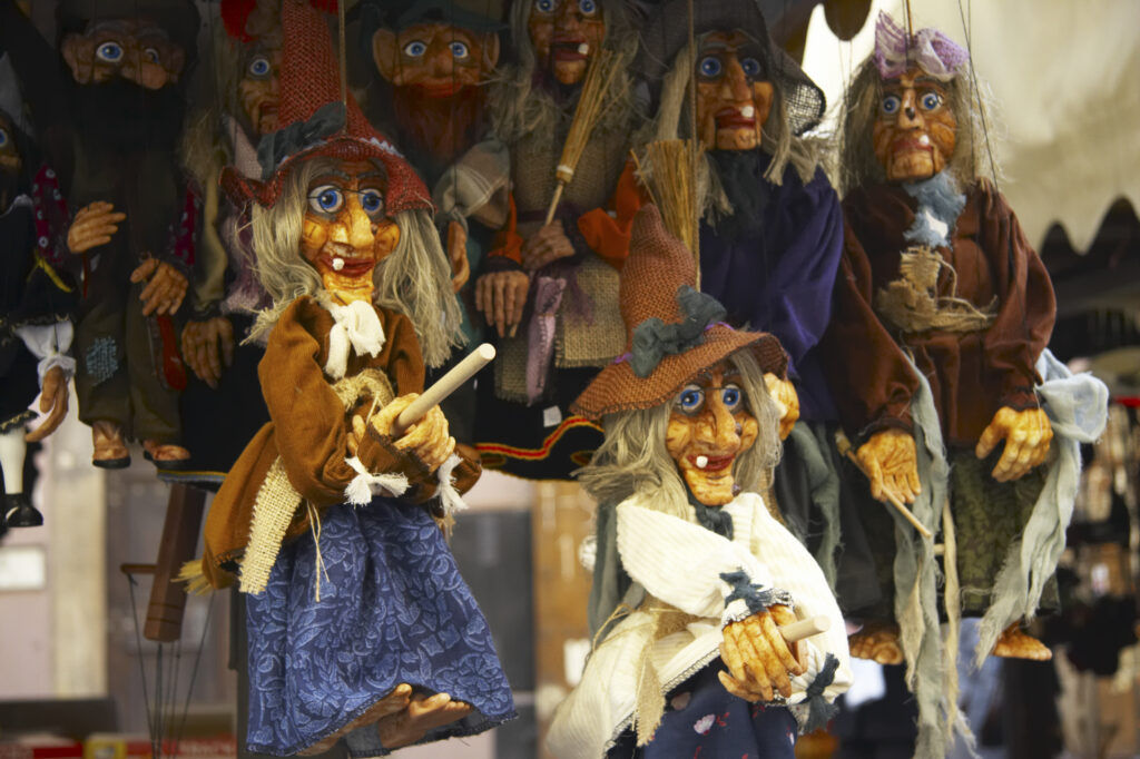 Czech Republic, Prague, Prague City. Traditional Czech witch puppet on a market stall in Prague