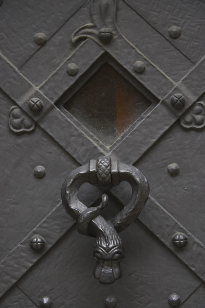 Czech Republic, Prague, Prague Castle. Detail of door on a building forming part of Prague Castle in the city of Prague.