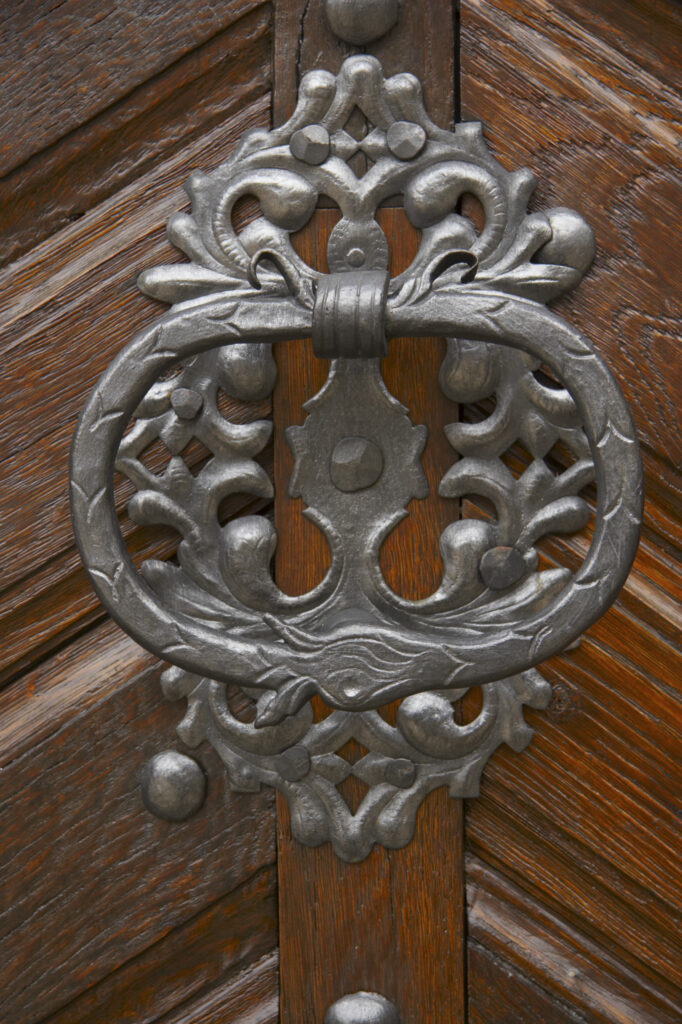 Czech Republic, Prague, Prague Castle. Detail of door on a building forming part of Prague Castle in the city of Prague.