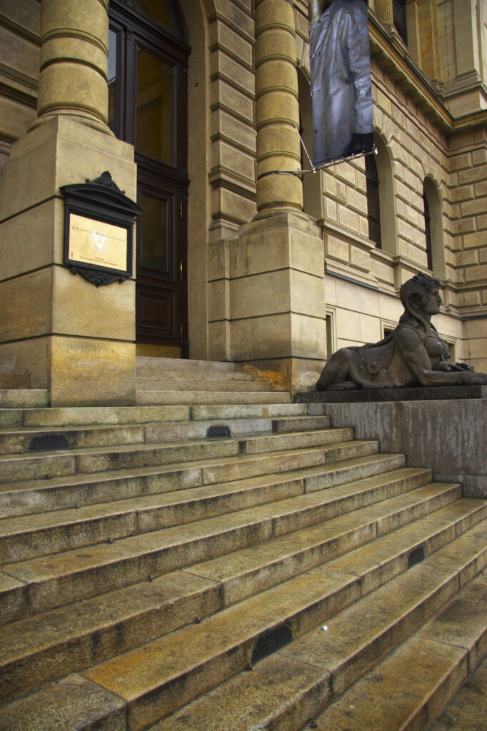 Czech Republic, Prague, Rudolfinum Concert Hall and Gallery. Statue and typical Prague architecture outside the Rudolfinum gallery
