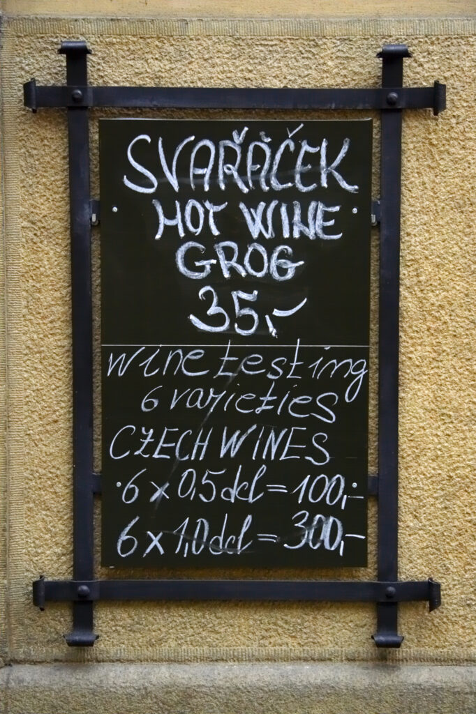 Czech Republic, Prague, Prague City. Hot wine grog sign on wall near the old town of Prague.