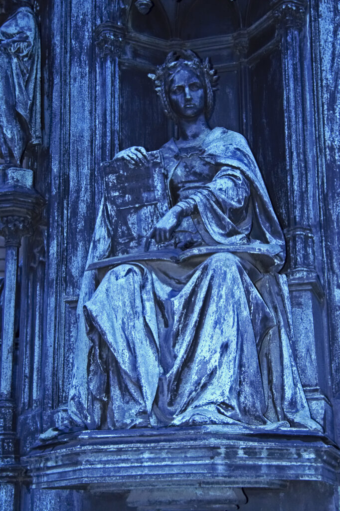 Czech Republic, Prague, Charles Bridge. Gothic statue / monument on the popular Charles Bridge of Prague city.