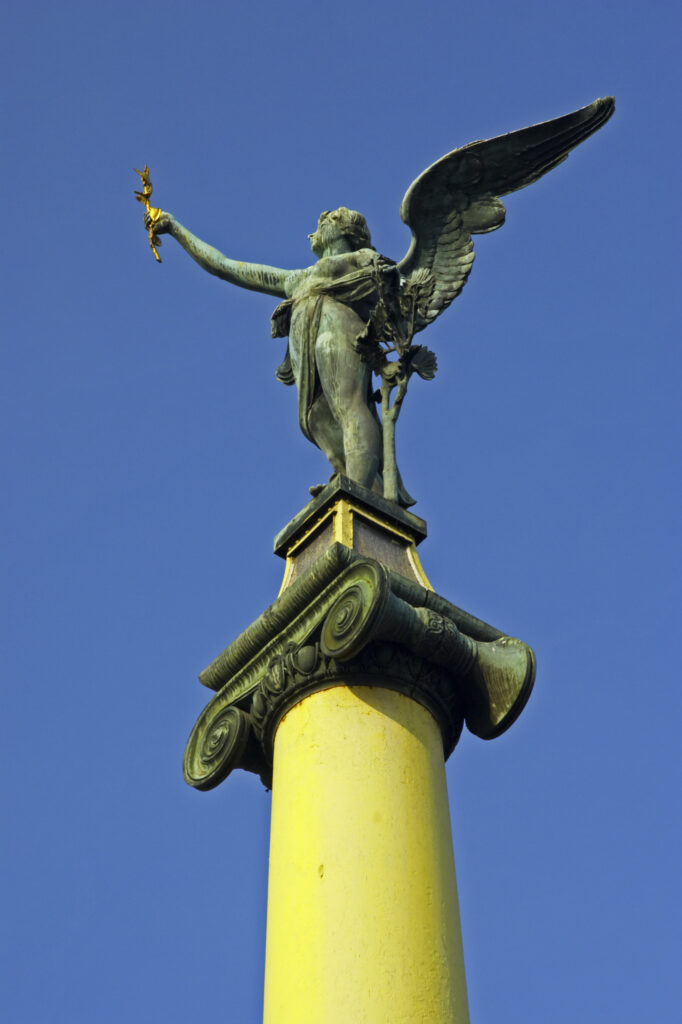 Czech Republic, Prague, Prague City. Art Noveau sculpture located on the Cech bridge spanning across the river Vltava.