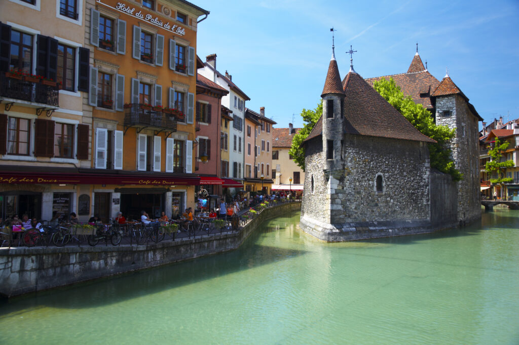 France, Rhône-Alpes, Annecy. The Palais de L'Isle, a former prison now converted to a museum, situated on the Thiou Canal, the main canal running through the heart of the town of Annecy.