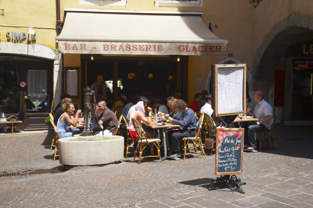 France, Rhône-Alpes, Annecy Street cafe / restuarant situated in a rustic back street within the old town area of Annecy