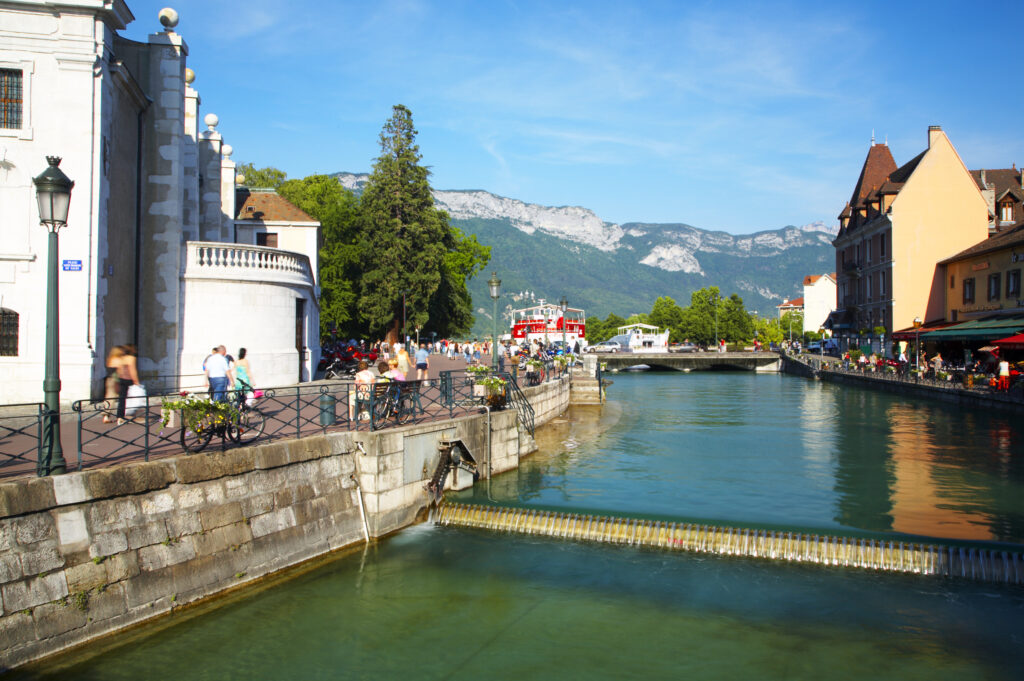 France, Rhône-Alpes, Annecy Rustic buildings situated on the Thiou Canal running through the heart of the town of Annecy