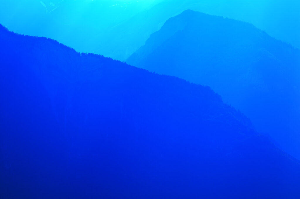 France, Rhône-Alpes, The Ecrins National Park. Mist lingers over the peaks of the Ecrins National Park near Le Bourg d Oisans.