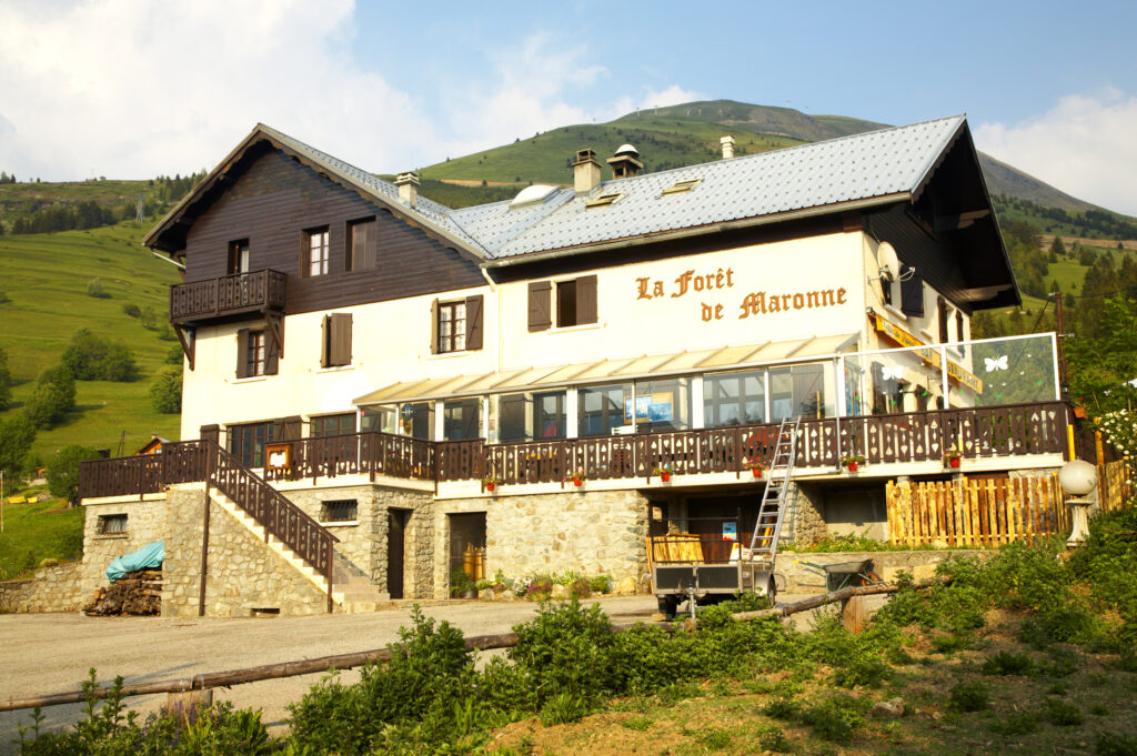 France, Rhône-Alpes, Huez. Wood lodge / restuarant located in the Alps near the Le Bourg d Oisans