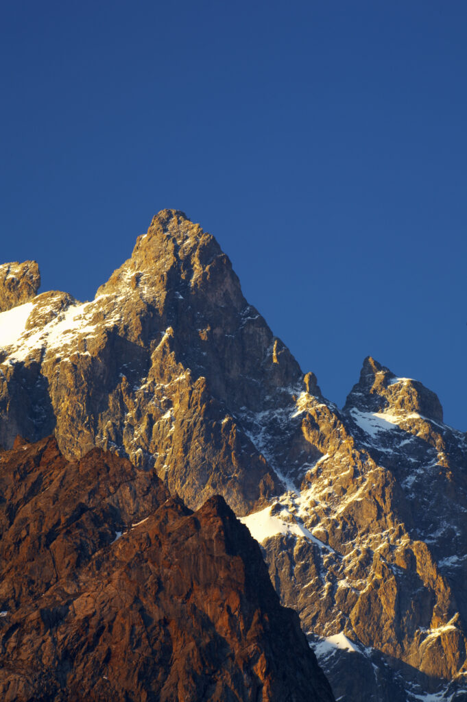 France, Rhône-Alpes, The Ecrins National Park. Morning light illuminates the peak of La Meije, within the Ecrins National Park near the village of La Grave.