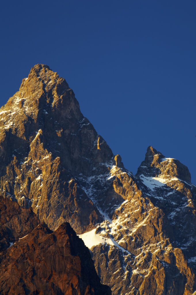France, Rhône-Alpes, The Ecrins National Park. Morning light illuminates the peak of La Meije, within the Ecrins National Park near the village of La Grave.