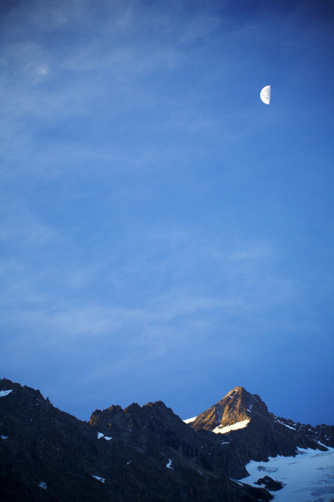 France, Rhône-Alpes, The Ecrins National Park. Morning light illuminates the peaks of the Ecrins National Park near La Meije