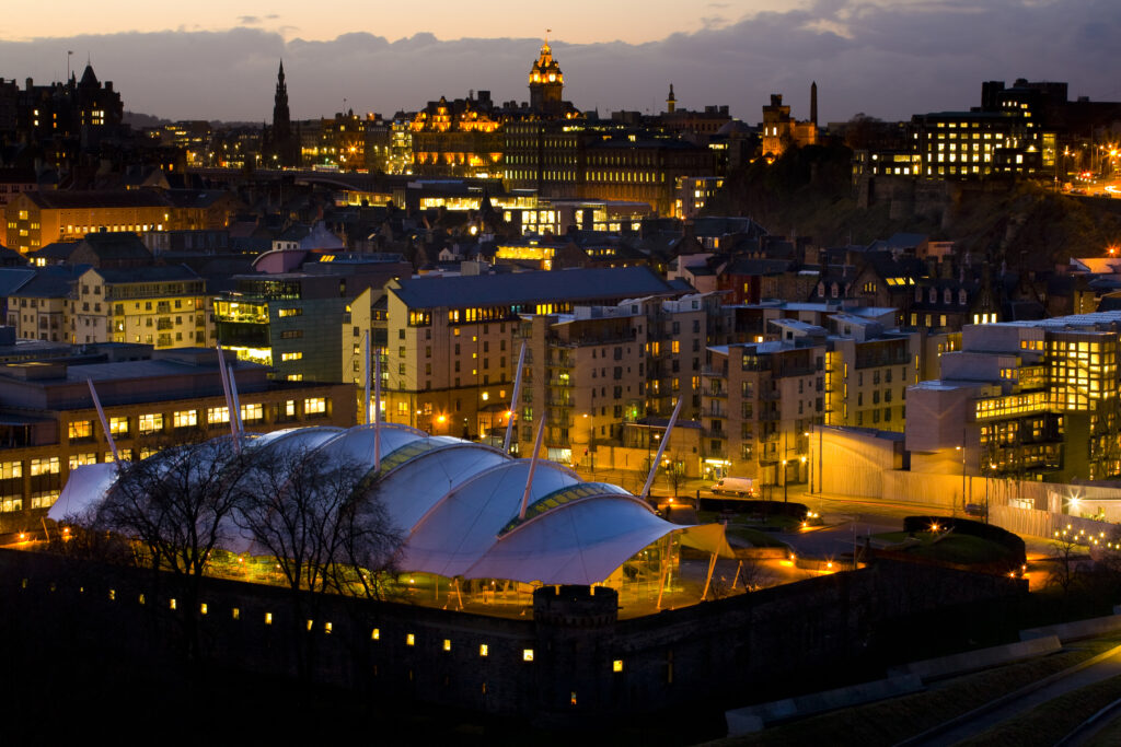 Scotland, Edinburgh, Holyrood. The 'Our Dynamic Earth' building in the foreground was a major part of the Holyrood urban regeneration plan, built on the former site of a Brewery and Gas works.
