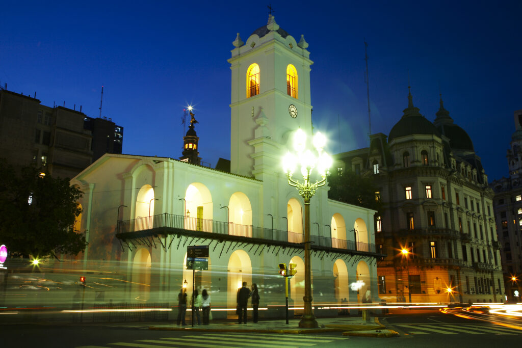 Argentina, Buenos Aires Province, Buenos Aires. Dusk scene of the Cabildo in the Plaza De Mayo in Buenos Aires.
