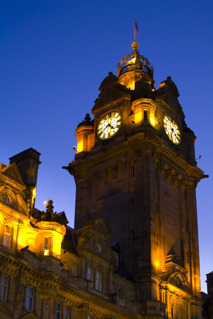 Scotland, Edinburgh, Balmoral Hotel. Often referred to as the most photographed clock tower in Scotland, the Balmoral Hotel is an impressive feature of the Edinburgh skyline.