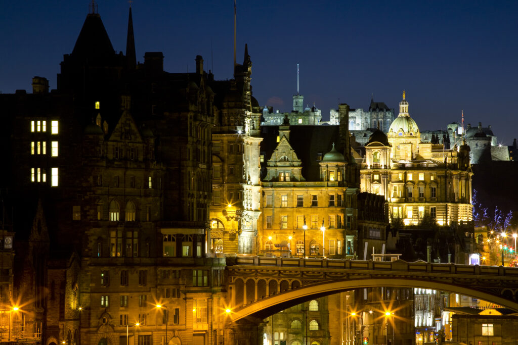 Scotland, Edinburgh, Old Town. Looking from the east of the North Bridge towards the Castle, Bank of Scotland and Scotsman building in the Old Town.