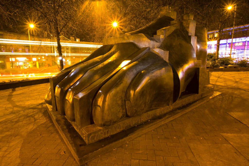 Scotland, Edinburgh, The Manuscript Of Monte Cassino. The Manuscript Of Monte Cassino, a three piece sculpture by Sir Eduardo Paolozzi located outside the St Mary's Roman Catholic Cathedral. Perhaps unsurprisingly, this sculpture is often referred to as the 'Big Foot'.