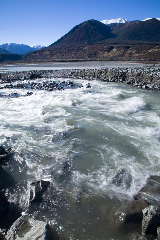 New Zealand, Canterbury, Arthur's Pass National Park. Creek running into the Poulter River and the Poulter Valley.