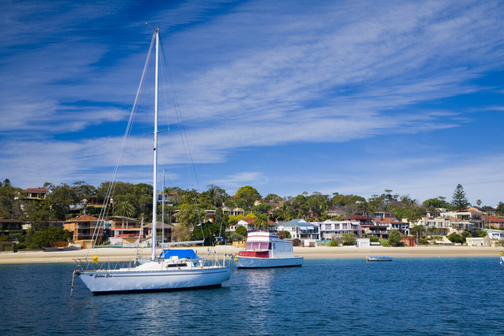 Australia, New South Wales, Sydney. Sailing ships moored in Gunnamatta Bay, looking towards Cronulla.