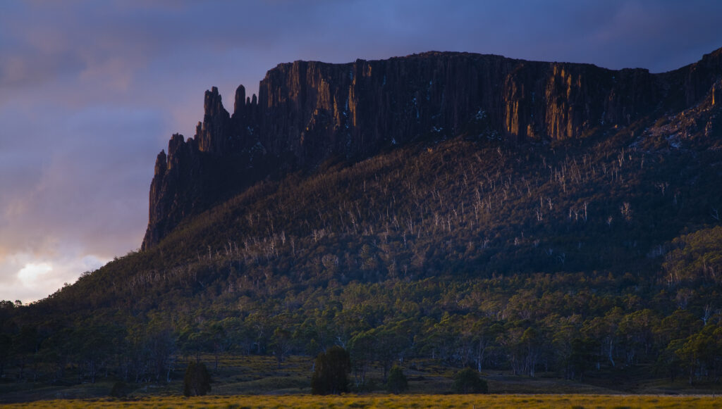 Australia, Tasmania, Cradle Mt - Lake St Clair National Park. Dramatic sky and Mount Oakleigh seen from New Pelion Hut on the Overland Track.