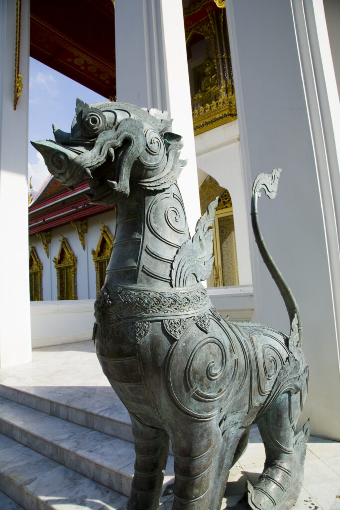 Thailand, Bangkok, Wat Benchamabophit. Statue outside the Wat Benchamabophit also known as the Marble Temple