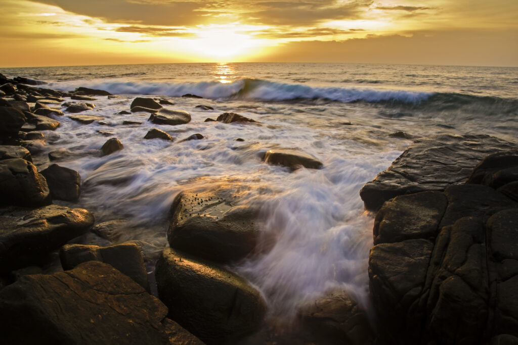 Borneo, Sabah Malaysia, Tunku Abdul Rahman Park. Sunset viewed from the west coast of Pulau Sapi - Sapi Island.