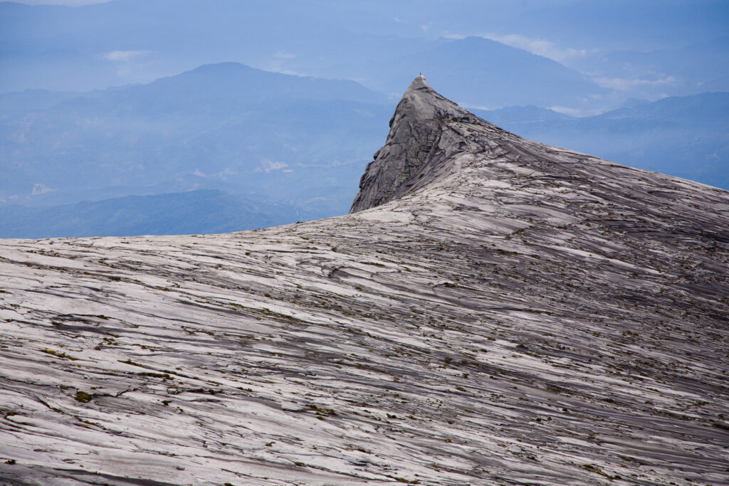 Sabah Malaysia, Borneo, Kinabalu National Park. The dramatic landscape of Mount Kinabalu - The highest mountain peak in South East Asia.
