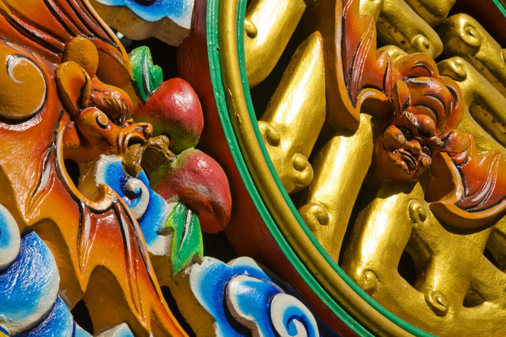 Thailand, Bangkok, Wat Chana Songkram. Colourful detail situated on the wall of a building forming part of the Wat Chana Songkram complex.