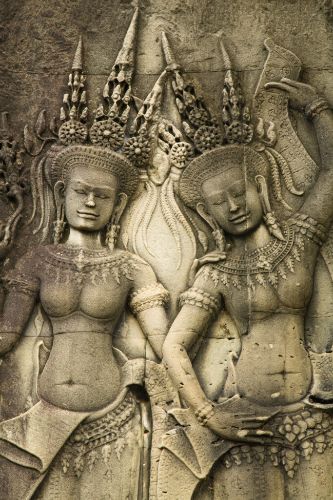 Cambodia, Angkor, Angkor Wat. Close up details of Angkor relief art on the walls of the dramatic remains of Angkor Wat.