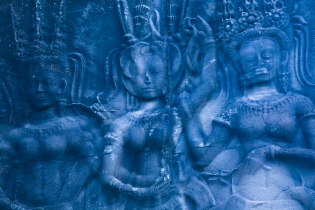 Cambodia, Angkor, Angkor Wat. Close up details of Angkor relief art on the walls of the dramatic remains of Angkor Wat.