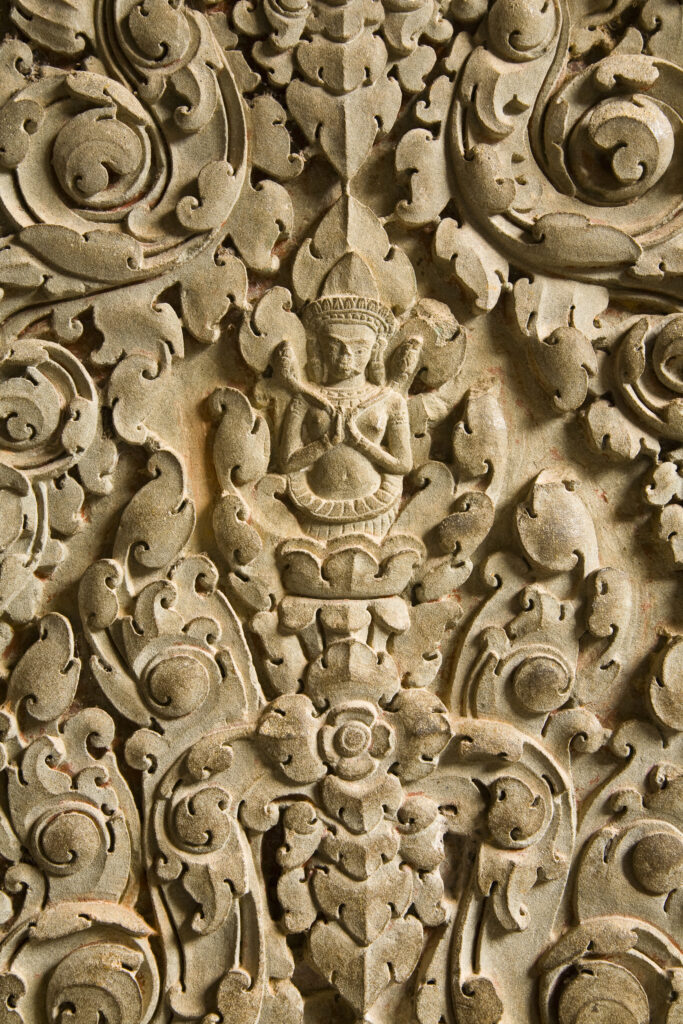 Cambodia, Angkor, Angkor Wat. Close up details of Angkor relief art on the walls of the dramatic remains of Angkor Wat.