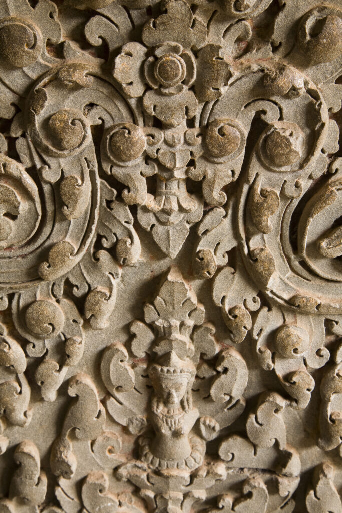 Cambodia, Angkor, Angkor Wat. Close up details of Angkor relief art on the walls of the dramatic remains of Angkor Wat.