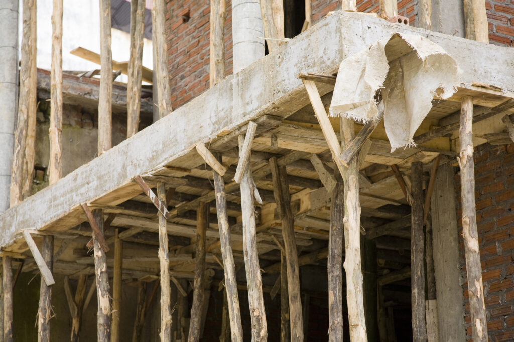 Vietnam, Northern Vietnam, Sapa. Scaffolding manufactured from local timber, at a building site in Sapa.
