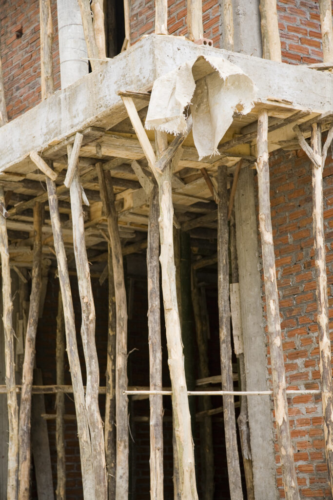 Vietnam, Northern Vietnam, Sapa. Scaffolding manufactured from local timber, at a building site in Sapa.