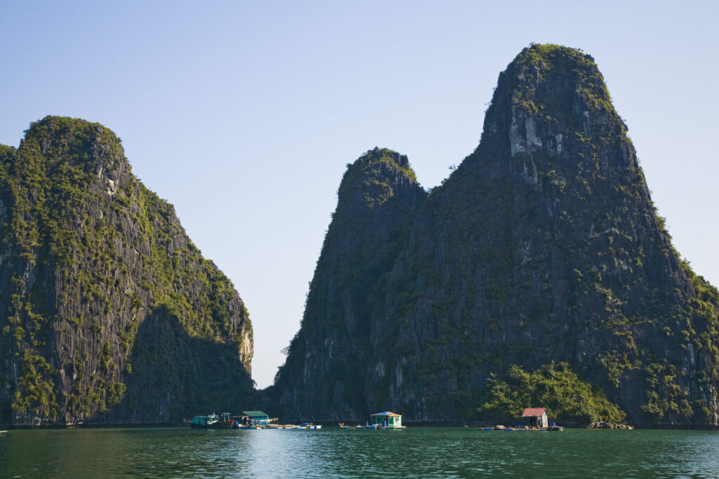 Vietnam, Northern Vietnam, Halong Bay. Water village amid the islands of Halong Bay near Cat Ba Island.