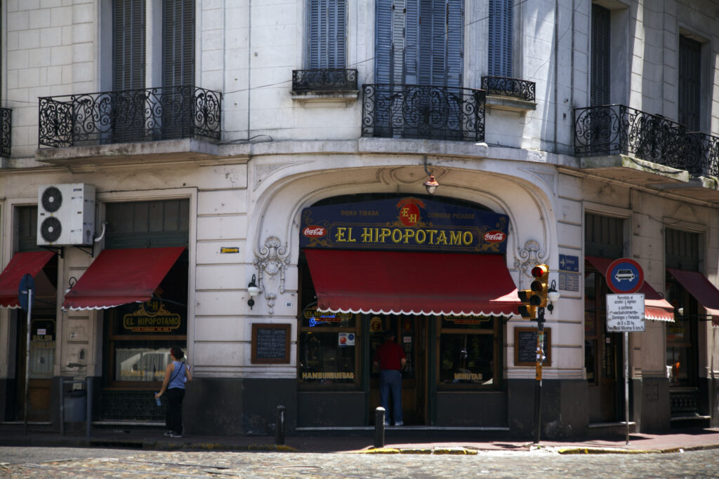 Argentina, Buenos Aires Province, Buenos Aires. The colourful facade of a cafe bar in the San Telmo area of Buenos Aires.