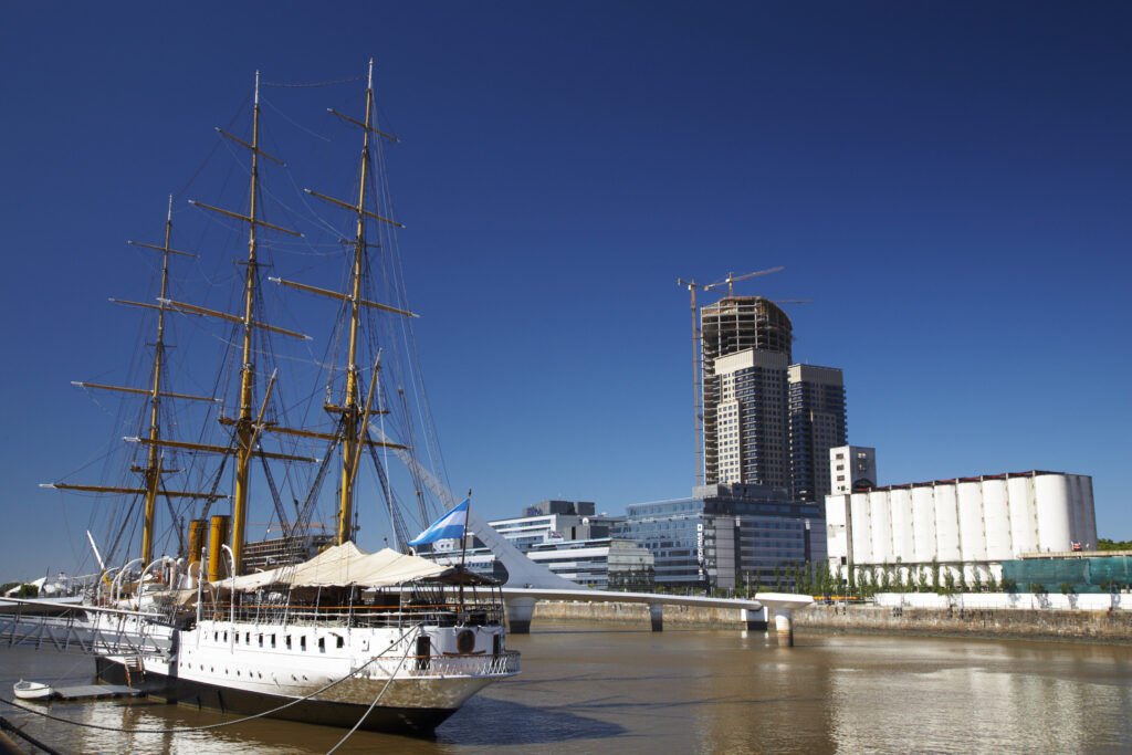 Argentina, Buenos Aires Province, Buenos Aires. Fragata Sarmiento, an historic saling ship moored on the dock side of Puerto Madero.