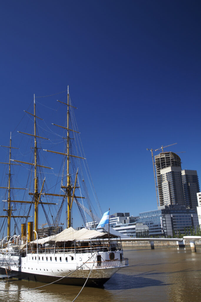 Argentina, Buenos Aires Province, Buenos Aires. Fragata Sarmiento, an historic saling ship moored on the dock side of Puerto Madero.