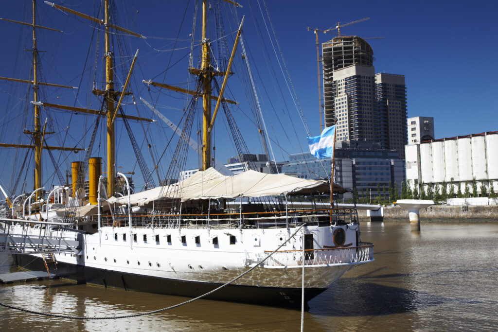 Argentina, Buenos Aires Province, Buenos Aires. Fragata Sarmiento, an historic saling ship moored on the dock side of Puerto Madero.