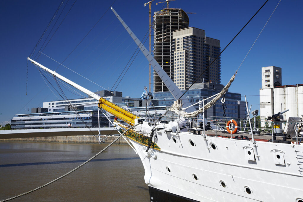 Argentina, Buenos Aires Province, Buenos Aires. Fragata Sarmiento, an historic saling ship moored on the dock side of Puerto Madero.