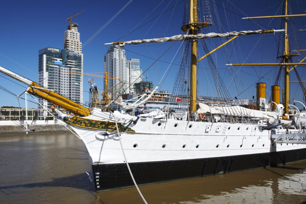 Argentina, Buenos Aires Province, Buenos Aires. Fragata Sarmiento, an historic saling ship moored on the dock side of Puerto Madero.