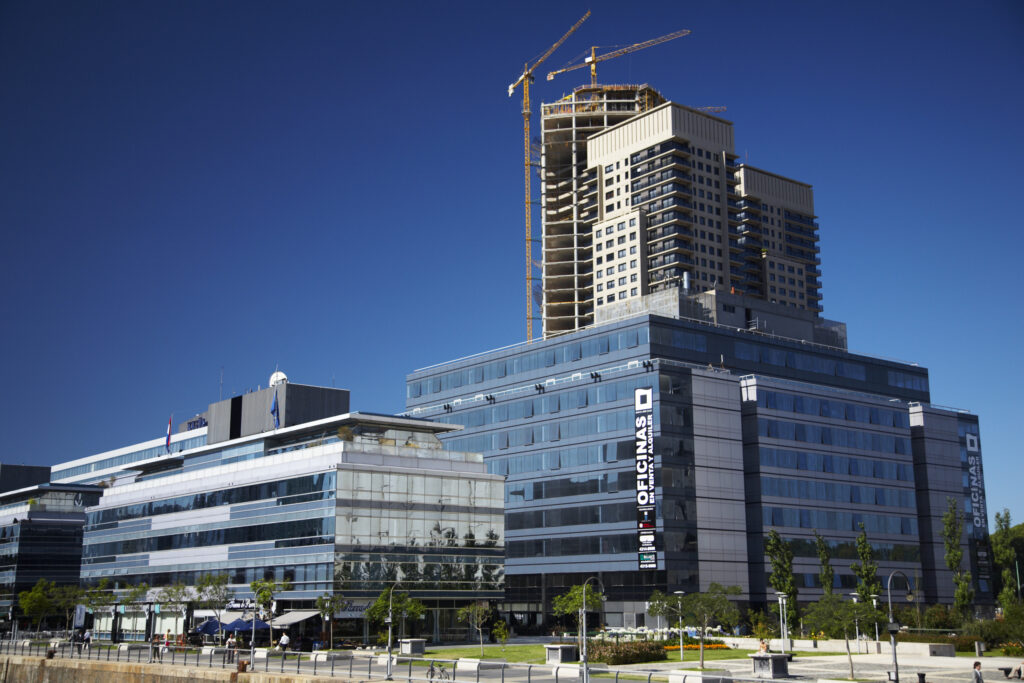 Argentina, Buenos Aires Province, Buenos Aires. New development of buidings and construction site on the restored dock side of Puerto Madero.