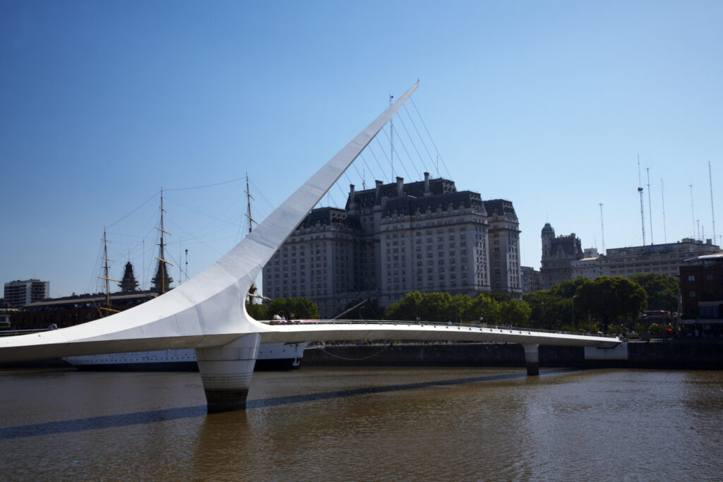 Argentina, Buenos Aires Province, Buenos Aires. Modern bridge on the restored dock side of Puerto Madero.