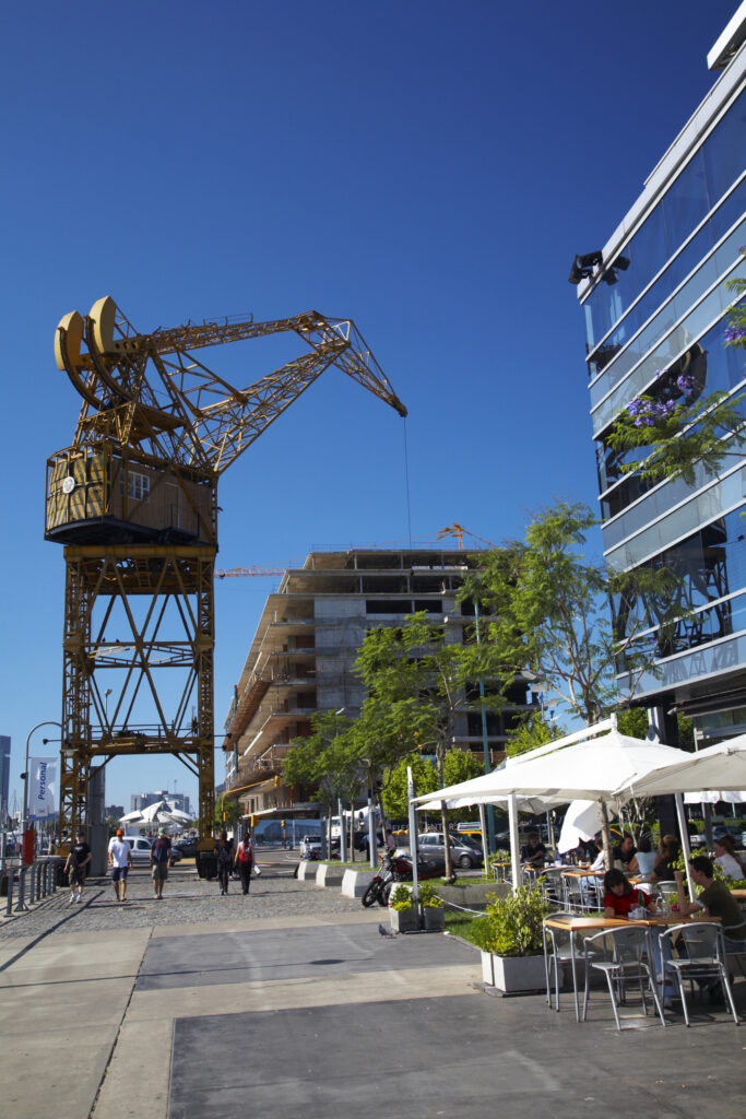 Argentina, Buenos Aires Province, Buenos Aires. Restored crane, situated near cafes and restaurants on the dock side of Puerto Madero.