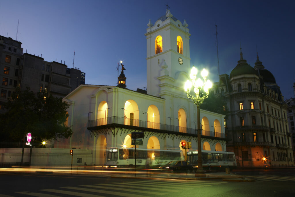 Argentina, Buenos Aires Province, Buenos Aires. Dusk scene of the Cabildo in the Plaza De Mayo in Buenos Aires.