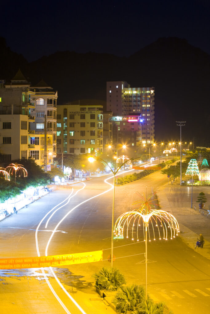 Vietnam, Northern Vietnam, Halong Bay. Night time scene of a road located near the harbour of Cat Ba Town on Cat Ba Island in Halong Bay.