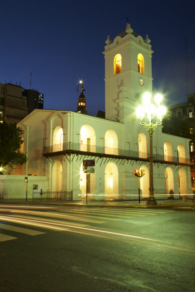 Argentina, Buenos Aires Province, Buenos Aires. Dusk scene of the Cabildo in the Plaza De Mayo in Buenos Aires.