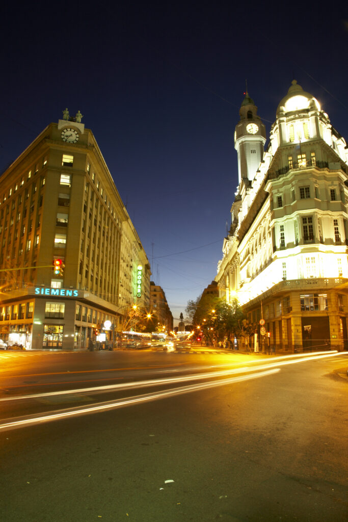 Argentina, Buenos Aires Province, Buenos Aires. Evening view of the buildings of the Av Julio Roca in Buenos Aires.