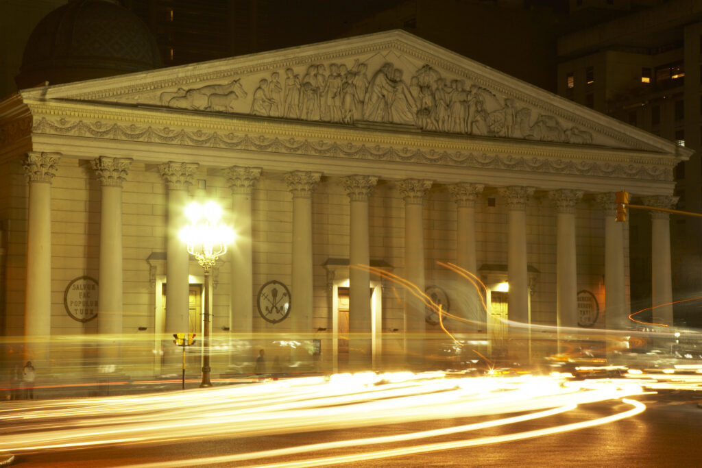 Argentina, Buenos Aires Province, Buenos Aires. Traffic trails outside the Catedral Metropolitana near the Plaza De Mayo in Buenos Aires.